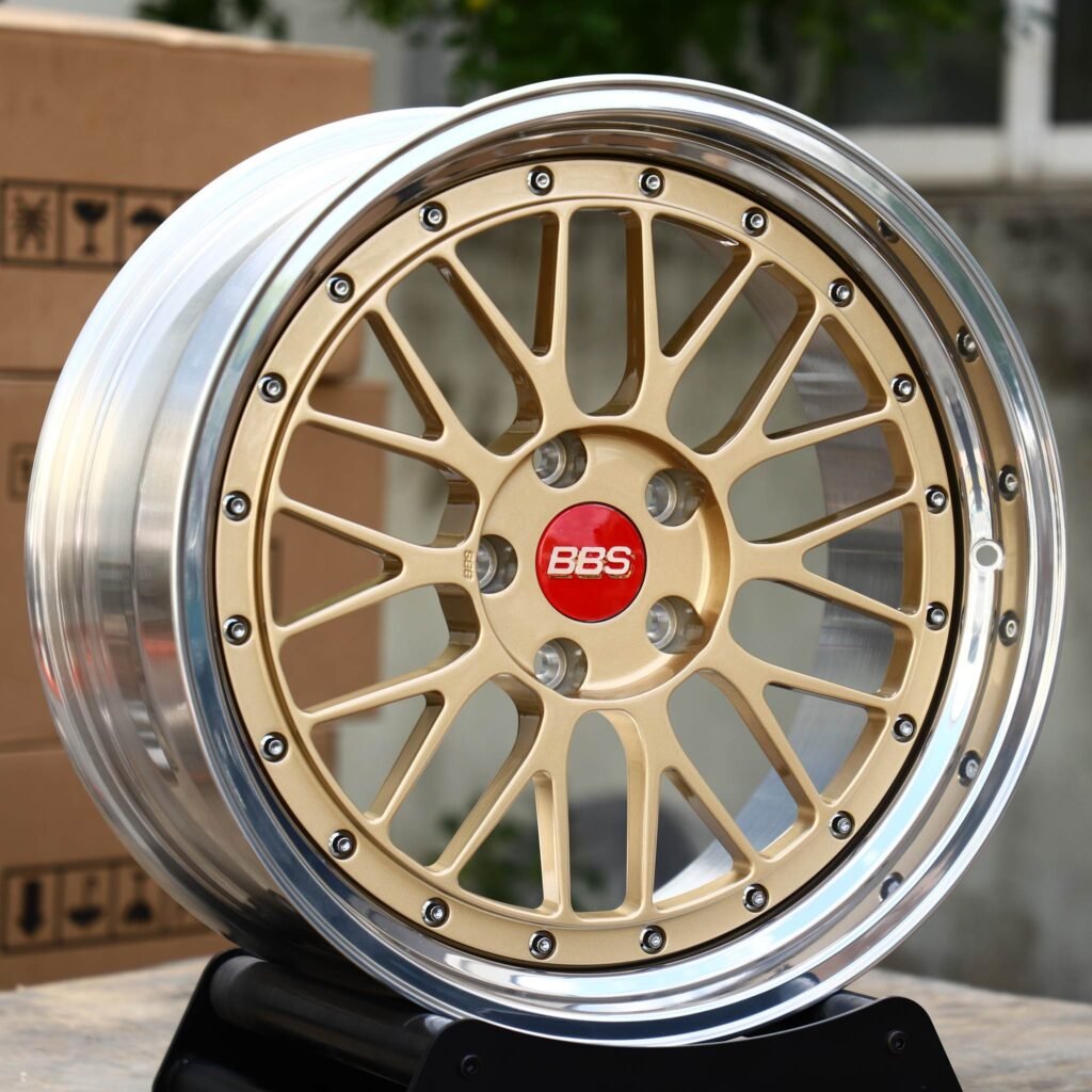 Audi A6 wheels – 2-Piece Gold Mesh Red Cap Polished Lip (BBS-Style), angled view