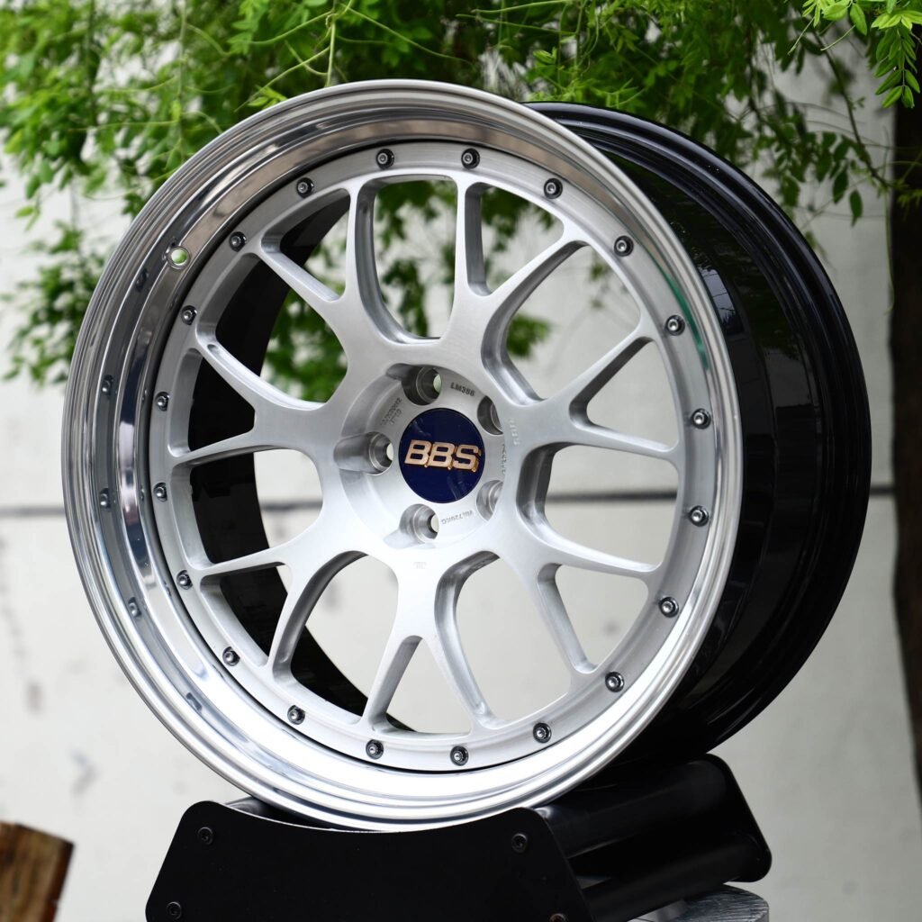 Toyota GR86 wheels – 2-Piece Silver Y-Spoke Mesh Polished Lip Blue Cap (BBS-Style), angled view