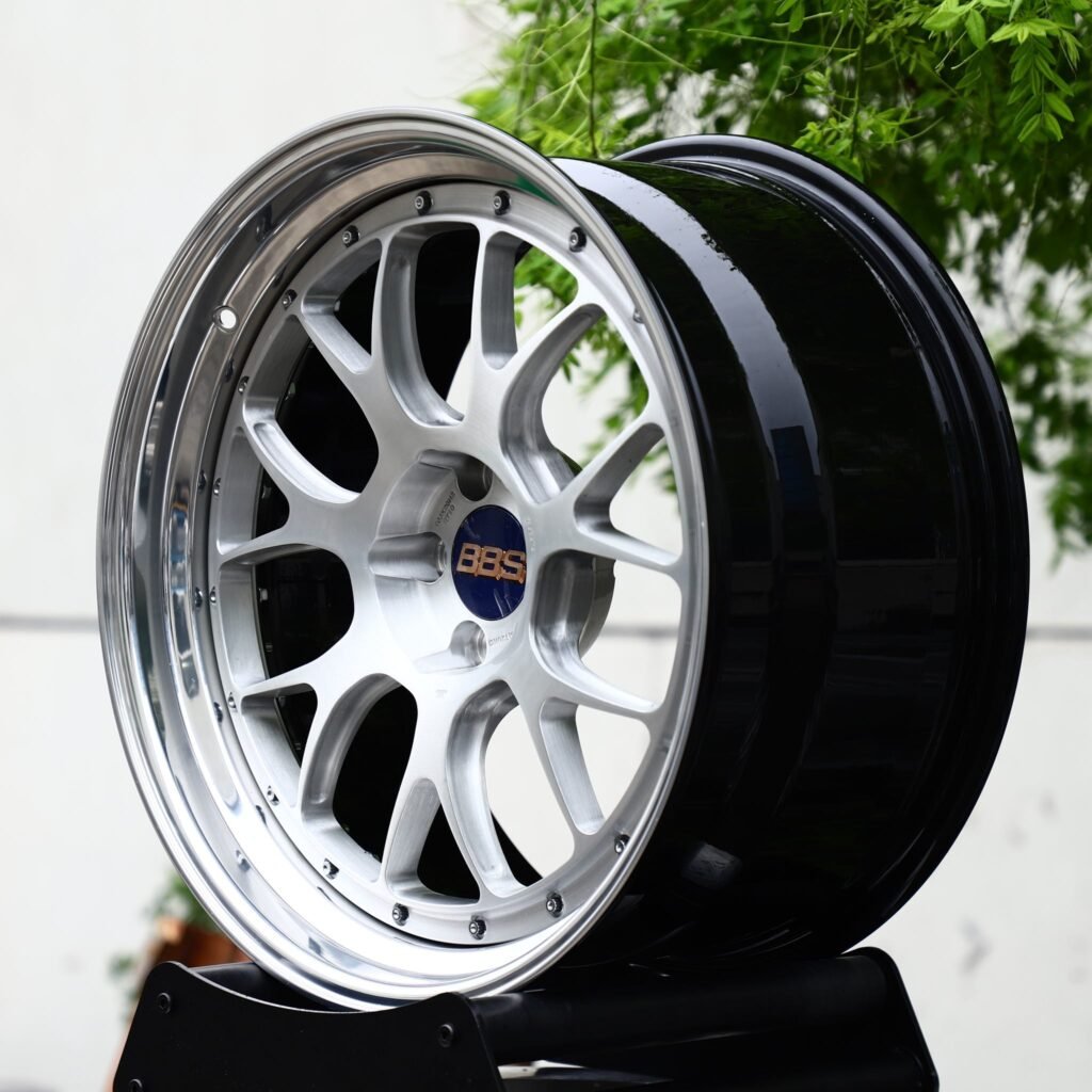5x114.3 wheels – 2-Piece Silver Y-Spoke Mesh Polished Lip Blue Cap (BBS-Style), side view
