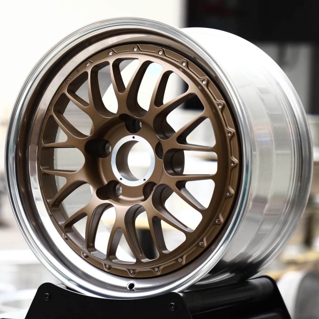 BMW M4 wheels – Matte Bronze Cross-Spoke Mesh 2-Piece Polished Lip (BBS-Style), angled view