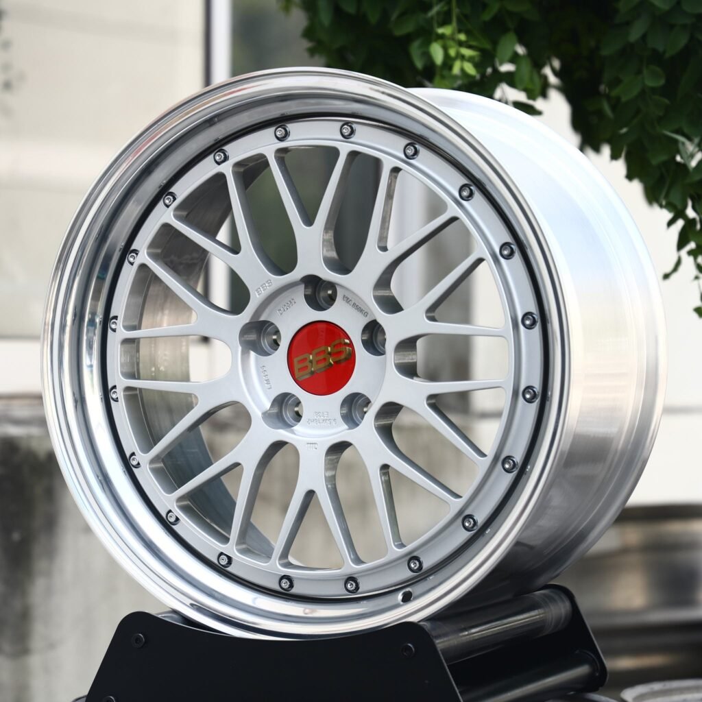 BMW M4 wheels – Silver Cross-Spoke Mesh 2-Piece Riveted Polished Lip (BBS-Style), angled view