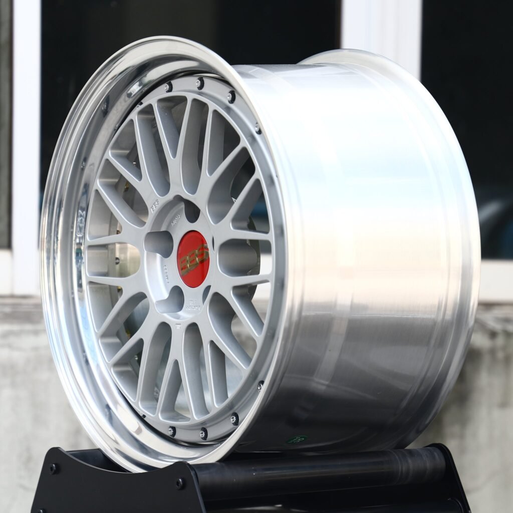 5x120 wheels – Silver Cross-Spoke Mesh 2-Piece Riveted Polished Lip (BBS-Style), side view