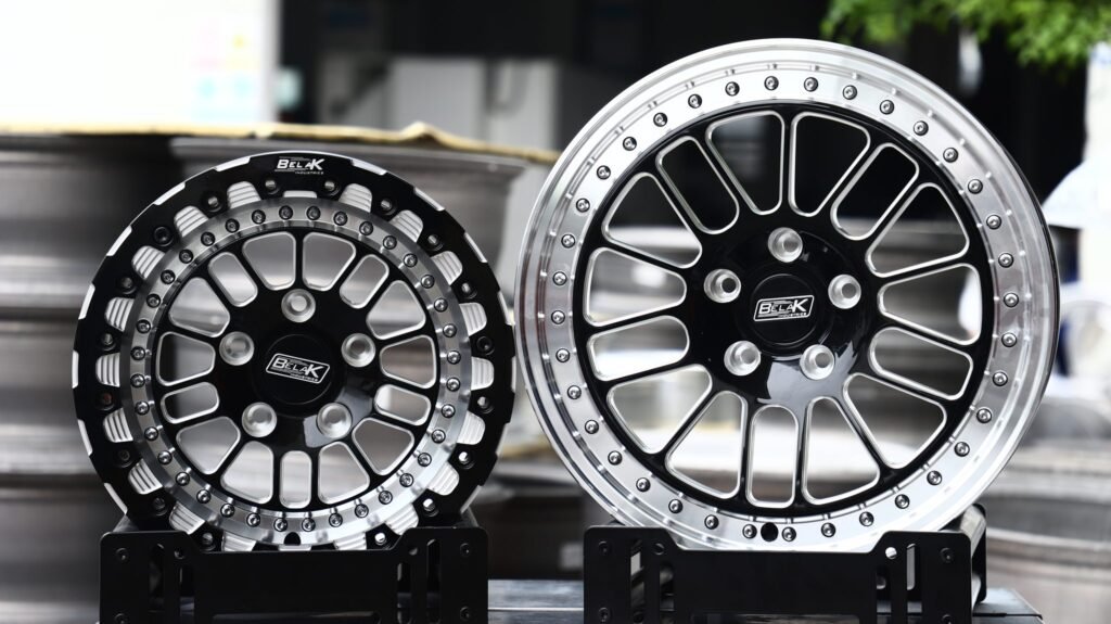 Subaru WRX STI wheels – Gloss Black Milled Mesh Polished Riveted Lip (Belak-Style), close-up view