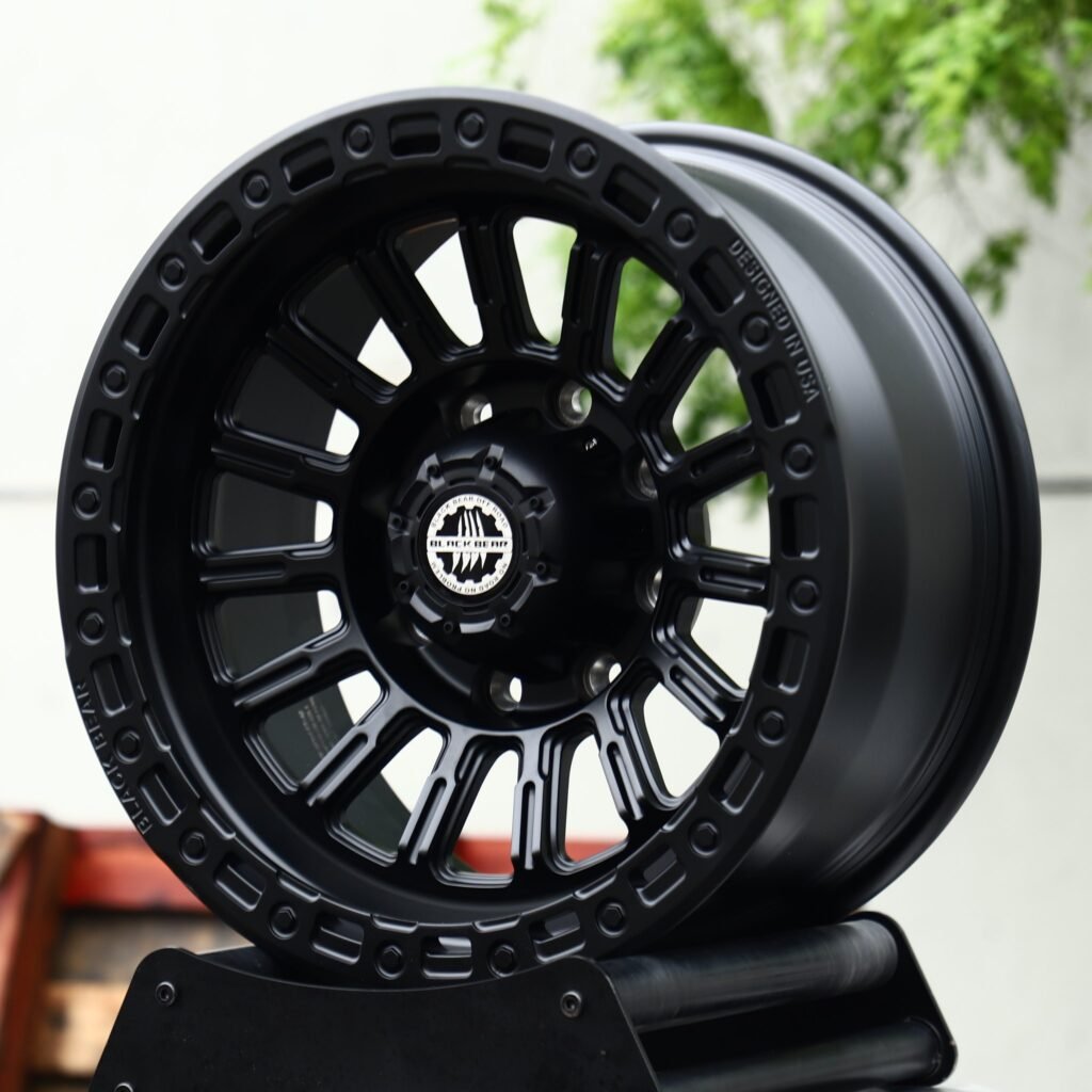 Ram 2500 wheels – Matte Black 18-Spoke (Black Bear-Style), angled view