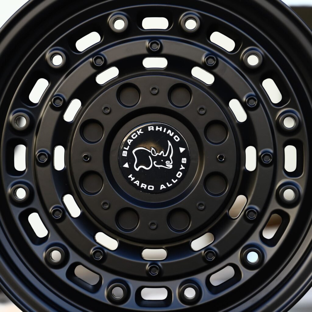Toyota 4Runner wheels – Matte Black Oval-Slot Bolt Ring (Black Rhino-Style), lip and barrel detail