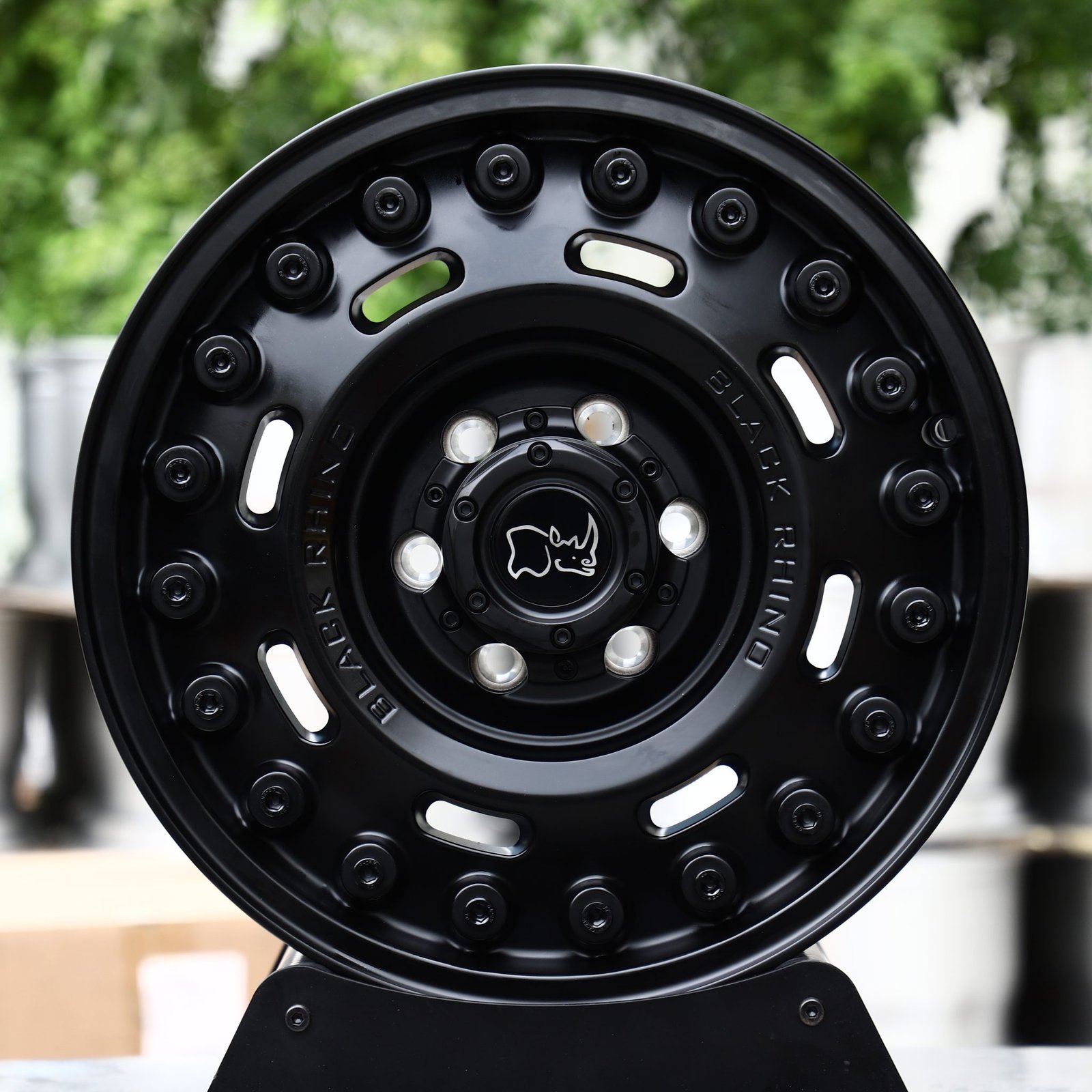 Chevrolet Silverado wheels – Matte Black Round-Slot Bolt Ring (Black Rhino-Style), front view
