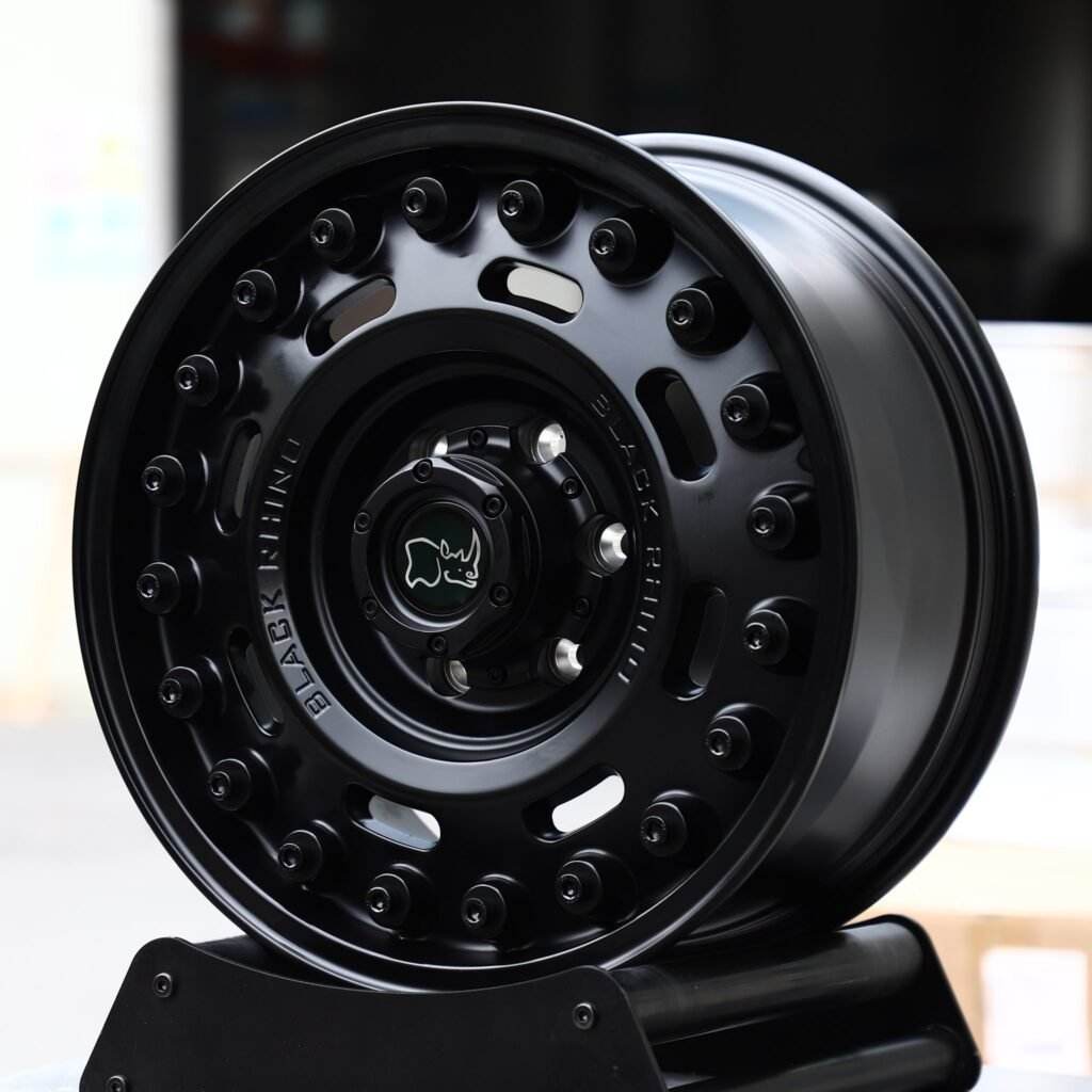 Ford F-150 wheels – Matte Black Round-Slot Bolt Ring (Black Rhino-Style), angled view