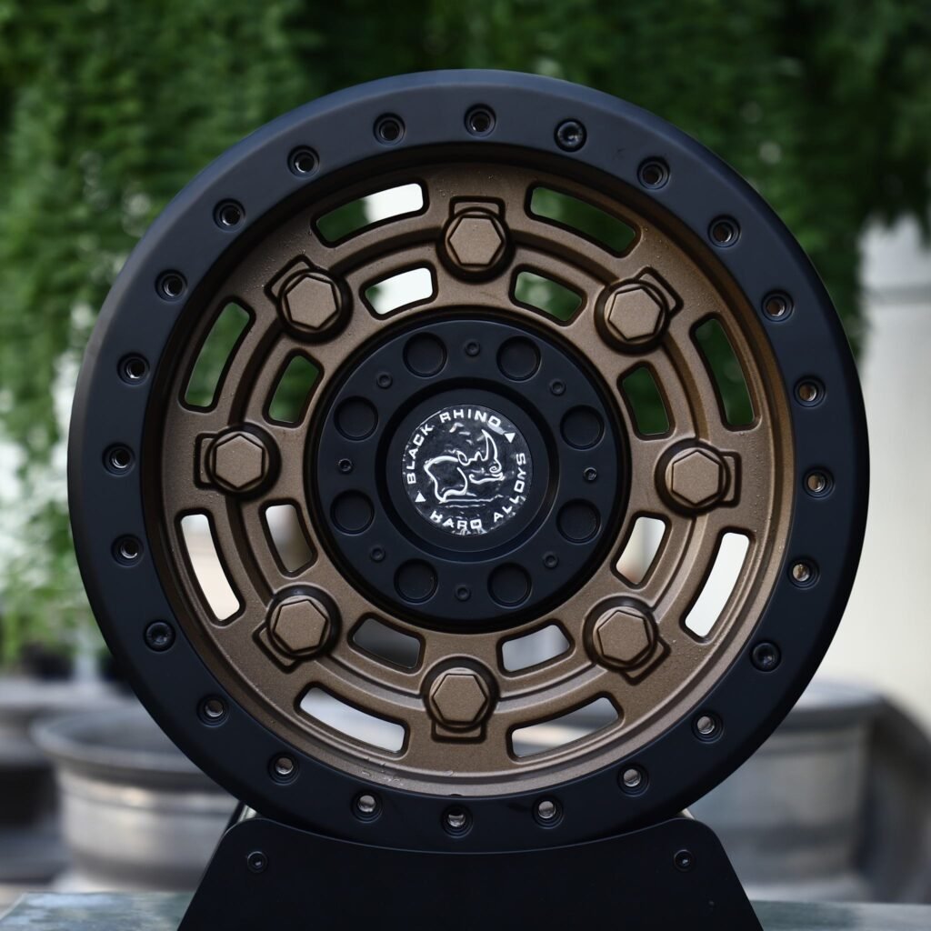 Toyota Land Cruiser wheels – Matte Bronze Slotted Black-Ring Beadlock (Black Rhino-Style), front view