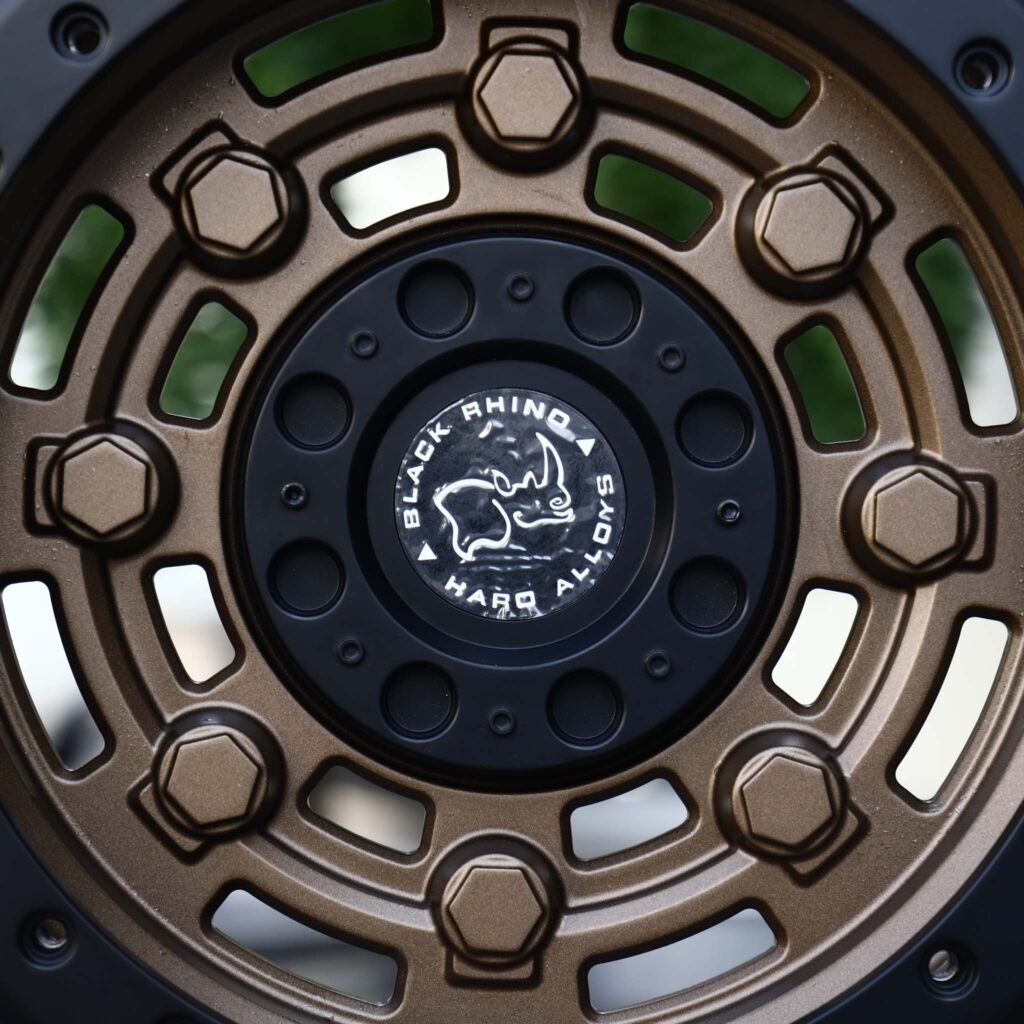 Toyota Tacoma wheels – Matte Bronze Slotted Black-Ring Beadlock (Black Rhino-Style), lip and barrel detail