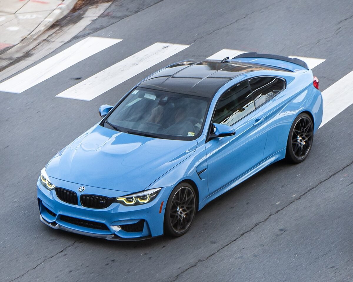 Light blue BMW M4 F82 coupe seen from above, a 5x120 bolt pattern car
