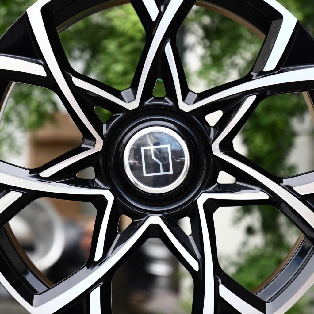 5x112 wheels – Gloss Black Machined 5-Petal Directional, side view