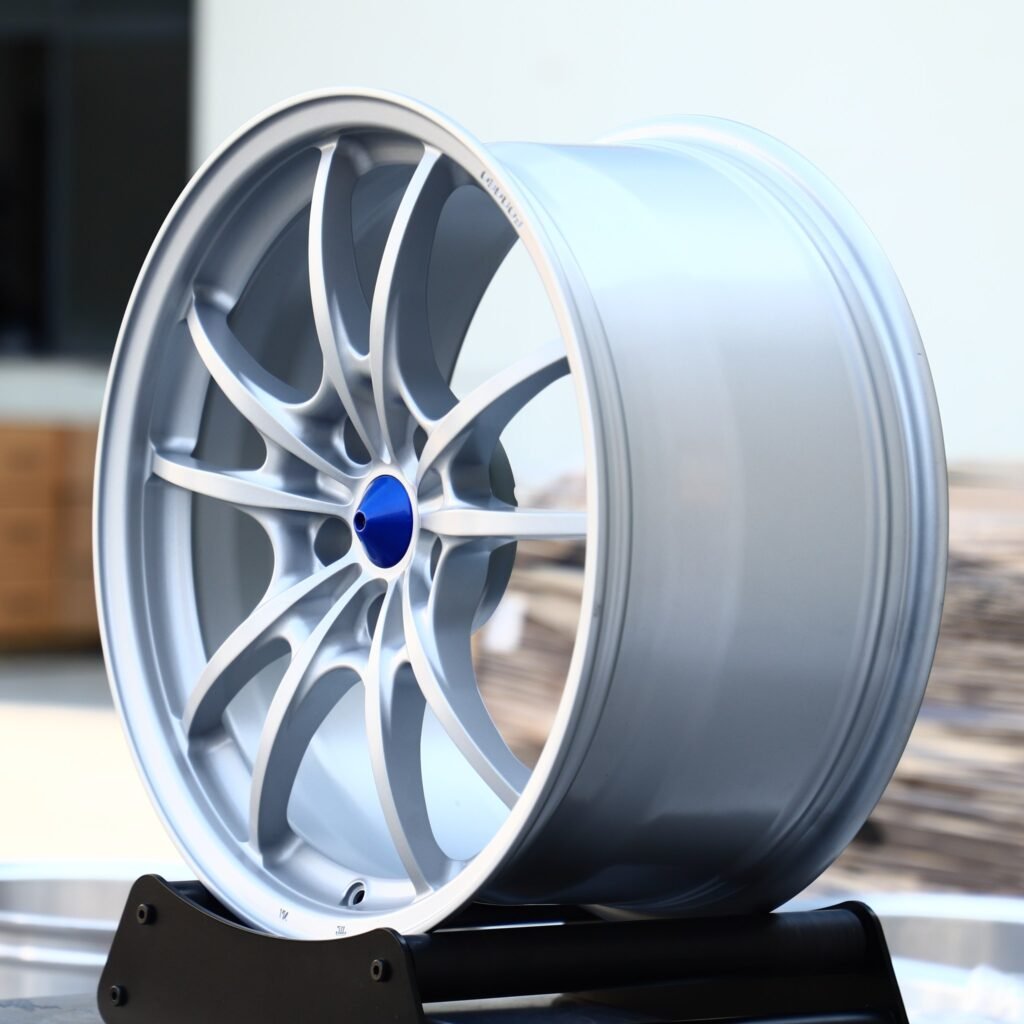 5x112 wheels – Matte Silver 10-Spoke Blue Cone Cap, side view