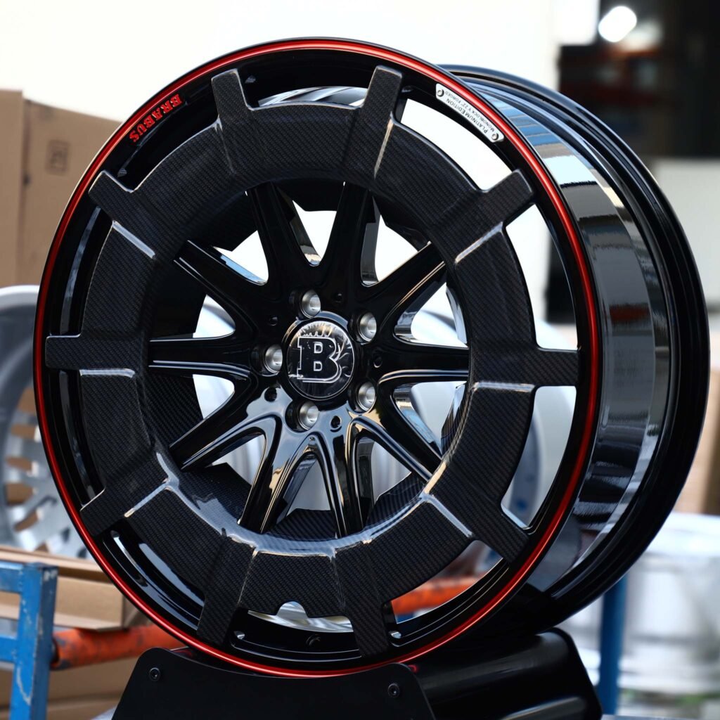Brabus 800 wheels – Gloss Black Carbon-Ring 10-Spoke Red Pinstripe (Brabus-Style), angled view