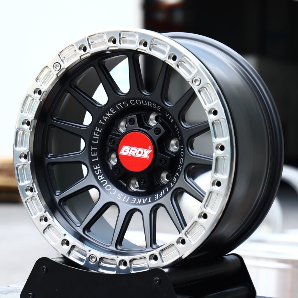 Chevrolet Tahoe wheels – Gunmetal 16-Spoke Polished Bolted Ring Beadlock (Brox-Style), angled view