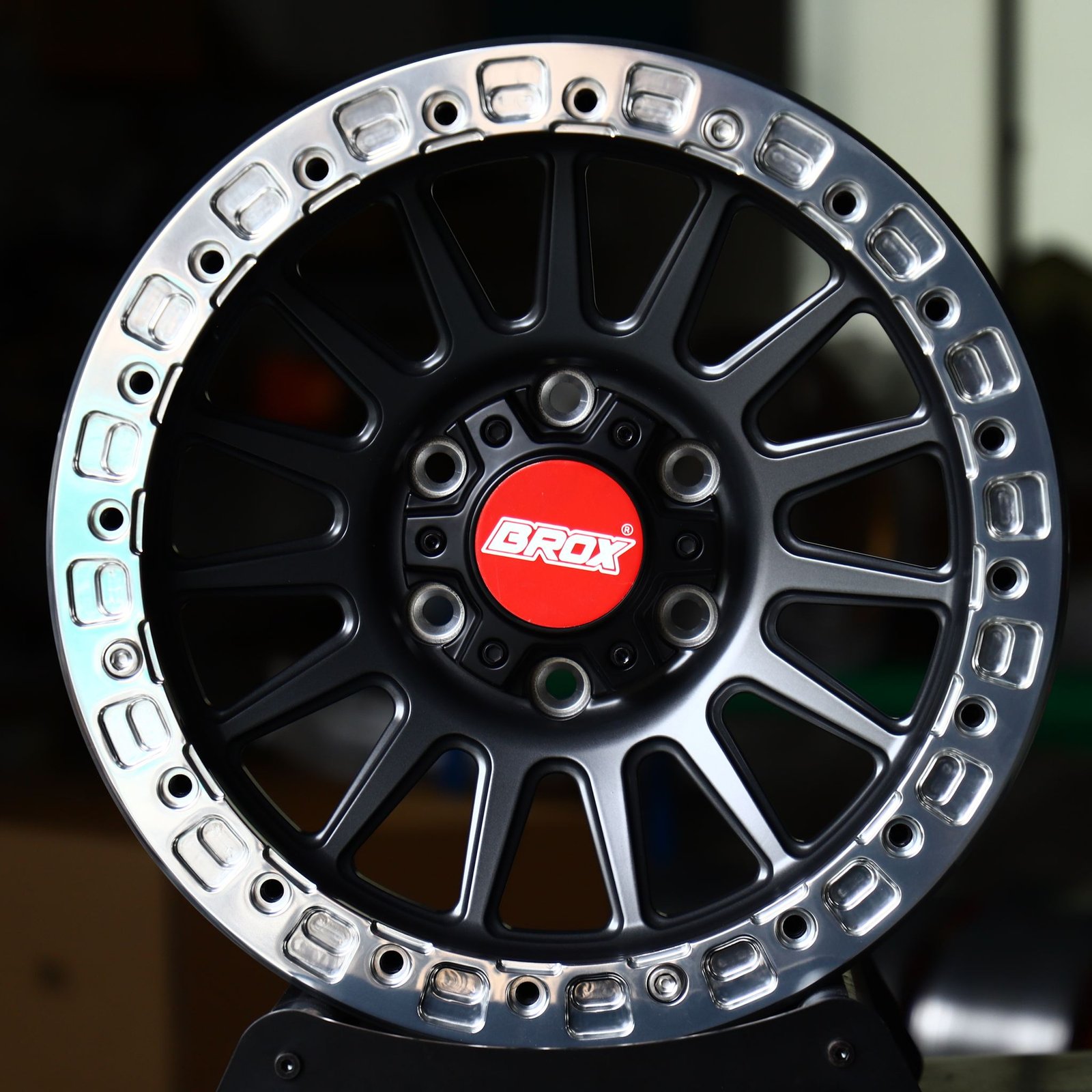 Toyota Tacoma wheels – Matte Black 14-Spoke Polished Bolted Ring Beadlock (Brox-Style), front view