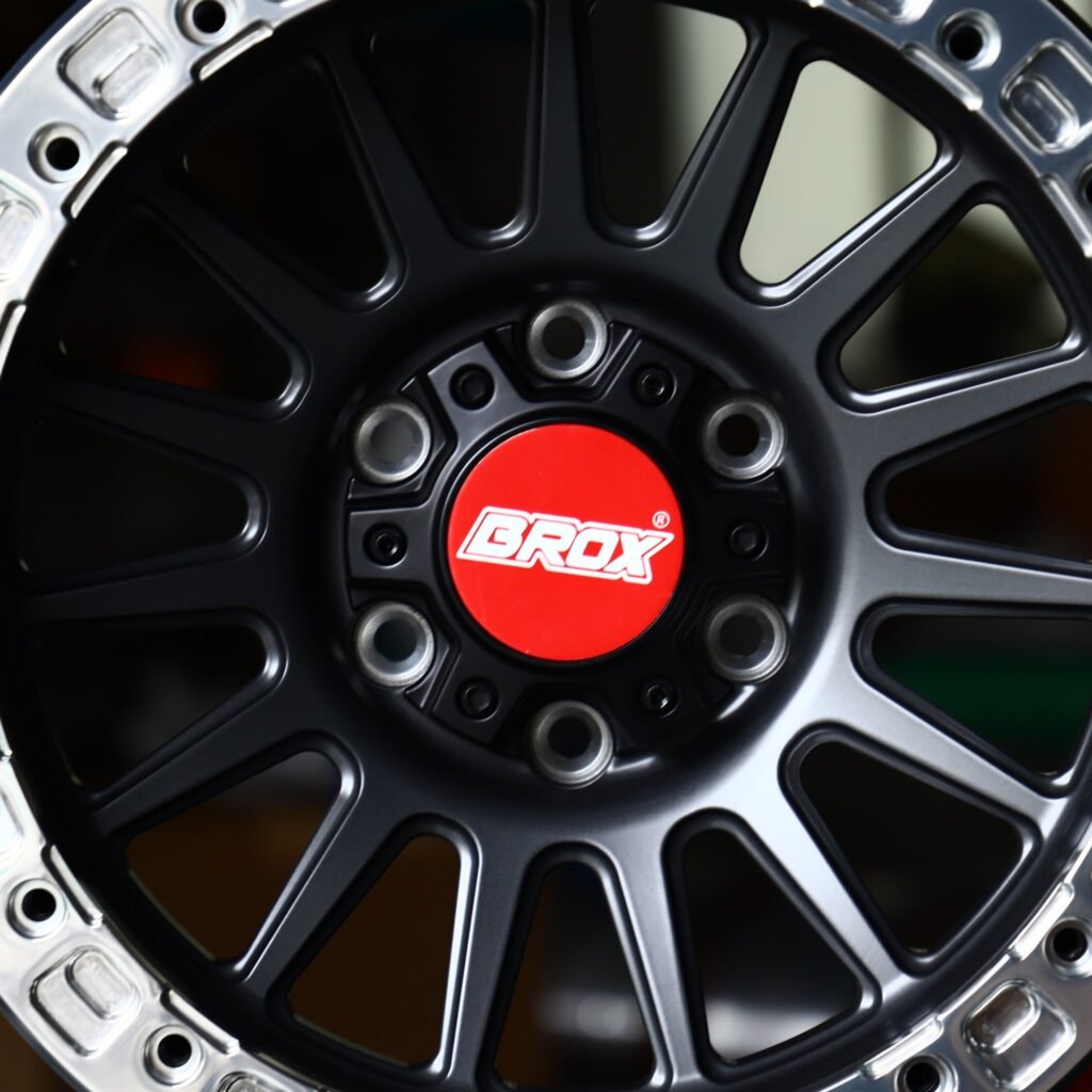 Toyota 4Runner wheels – Matte Black 14-Spoke Polished Bolted Ring Beadlock (Brox-Style), lip and barrel detail