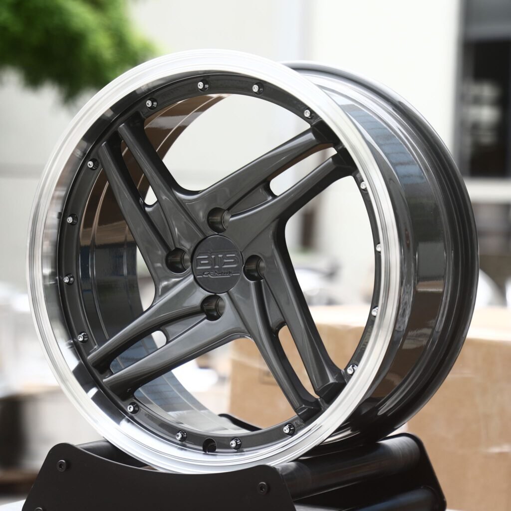 Honda Fit wheels – Gunmetal Twin 5-Spoke 2-Piece Riveted Polished Lip (BTS-Style), angled view