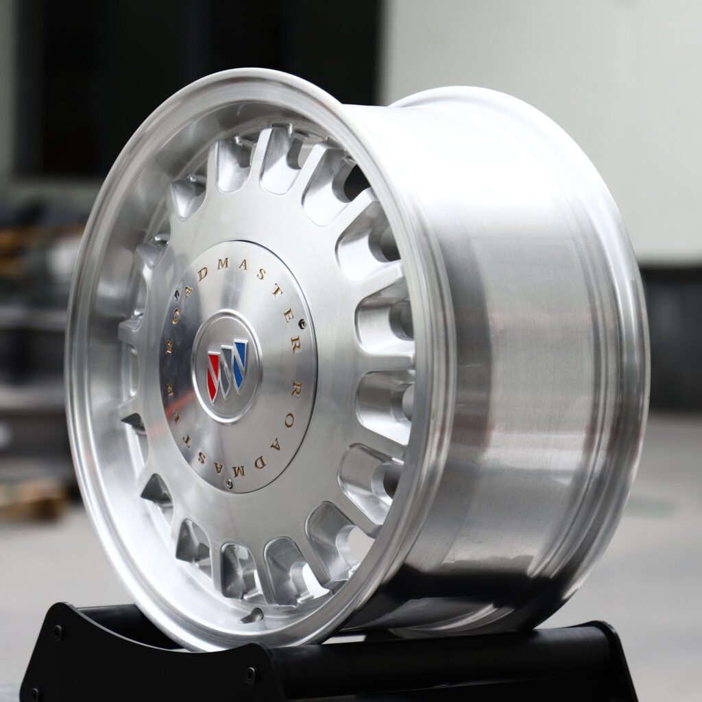 5x115 wheels – Brushed Silver Slotted Disc Polished Lip (Buick OEM-Style), side view