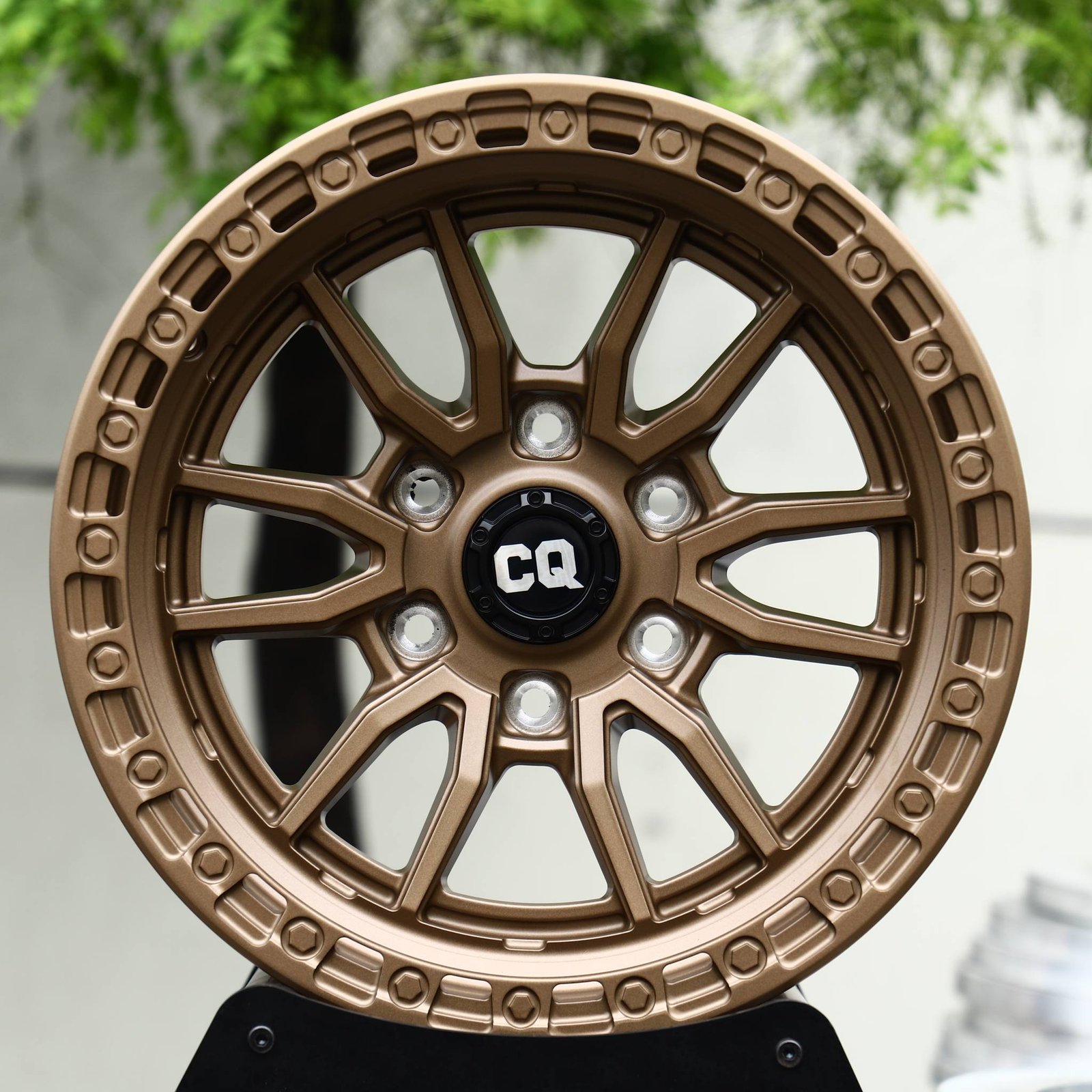 Chevrolet Colorado wheels – Bronze 12-Spoke Bolt Ring (CQ-Style), front view