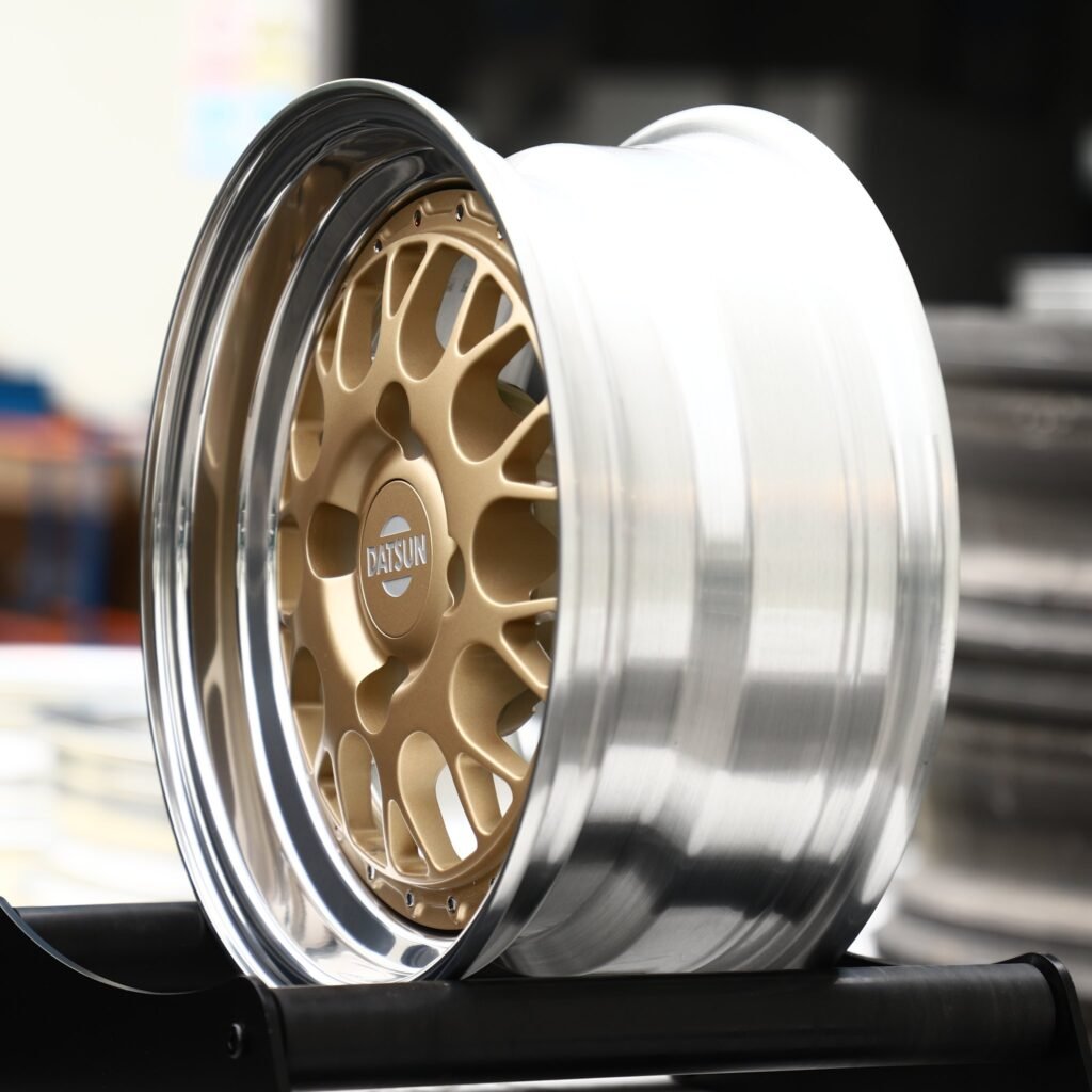 4x98 wheels – Gold Cross-Spoke Mesh 2-Piece Polished Lip (Datsun OEM-Style), side view
