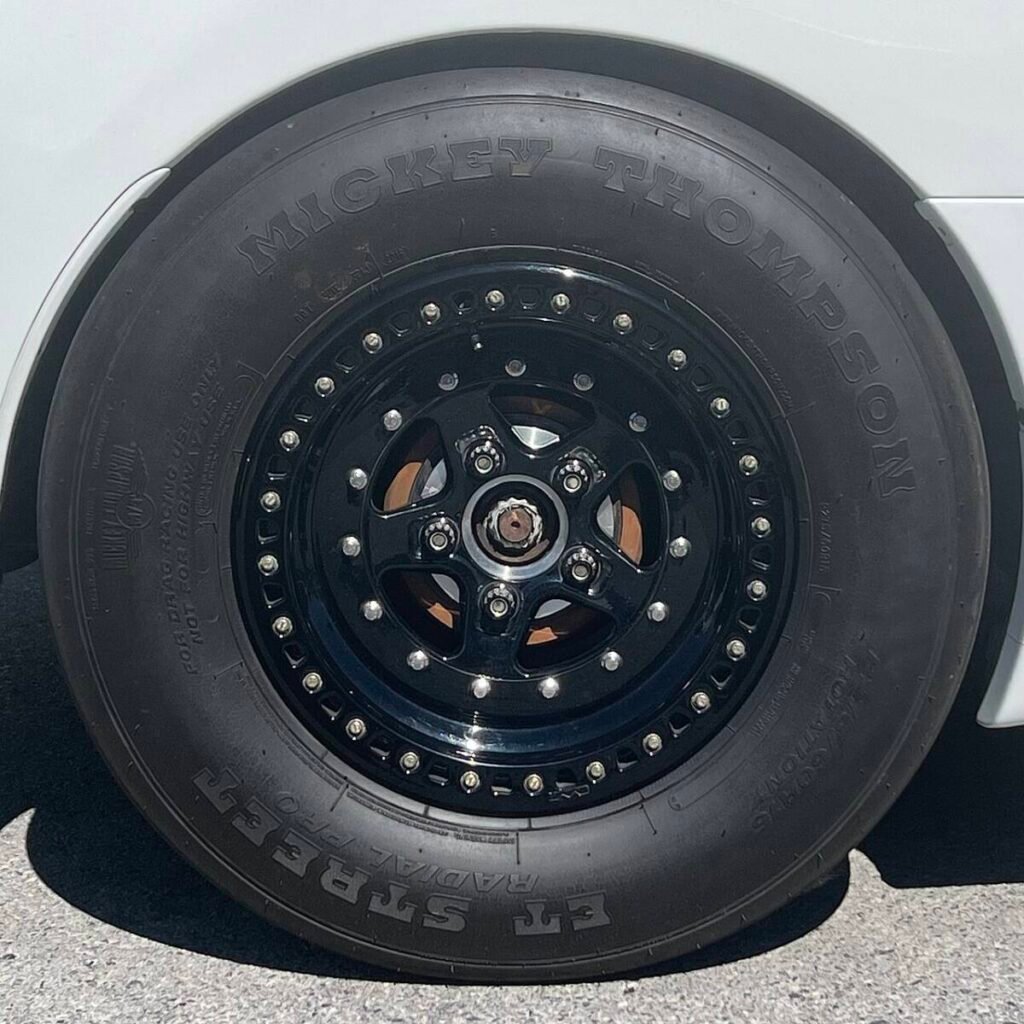 Drag radial wheel width example: Mickey Thompson ET Street Radial Pro on a black beadlock drag wheel