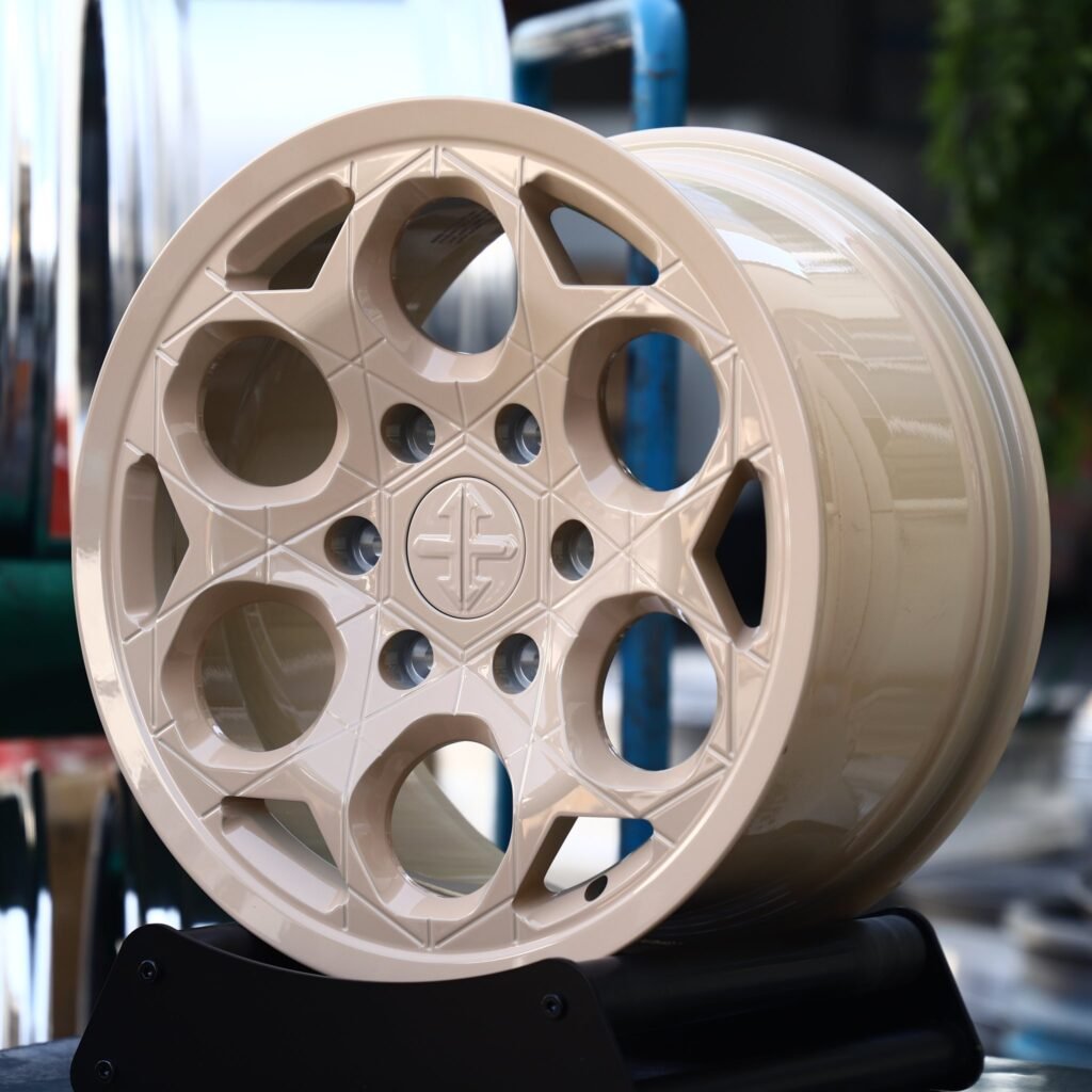 Toyota Tacoma wheels – Sand Beige Round-Hole, angled view