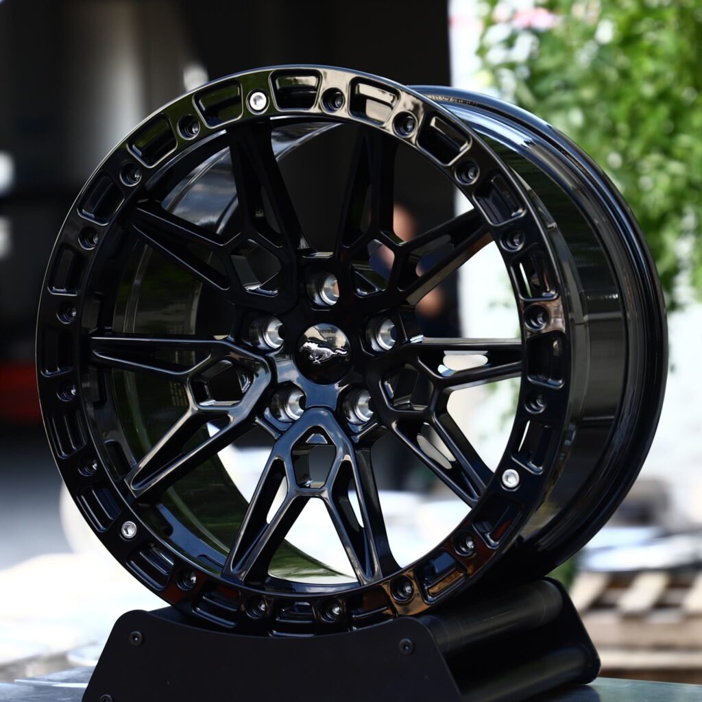Ford Mustang GT wheels – Gloss Black Multi-Spoke Bolt Ring Beadlock (Ford Mustang OEM-Style), angled view