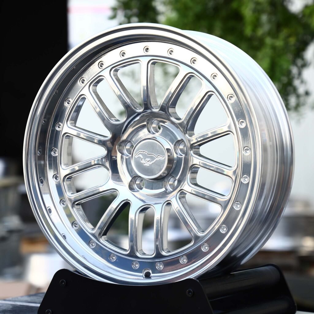 Ford Mustang GT wheels – Polished Ringed 15-Spoke (Ford Mustang OEM-Style), angled view