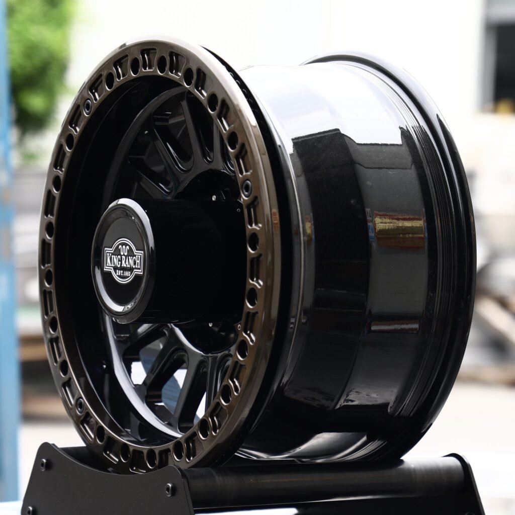 8x170 wheels – Gloss Black 15-Spoke Bronze-Ring Beadlock (Ford OEM-Style), side view