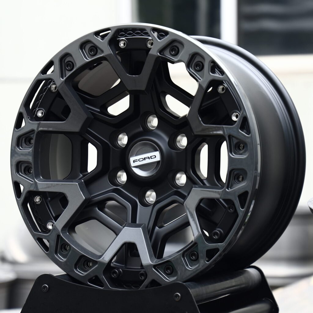 Ford F-150 wheels – Matte Black Web-Spoke Bolt Ring Beadlock (Ford OEM-Style), angled view