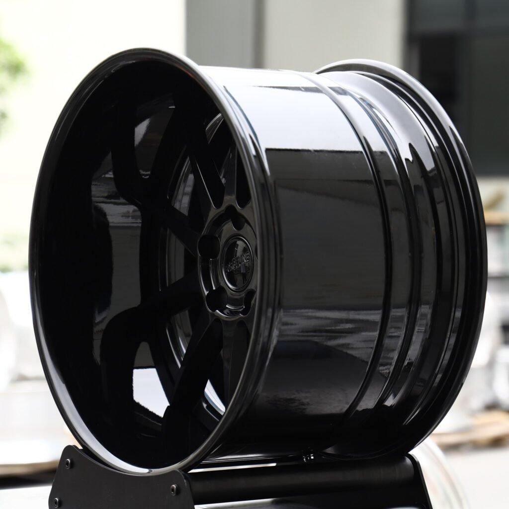 Toyota Camry wheels – Gloss Black 10-Spoke Deep Lip (Forgeline-Style), angled view