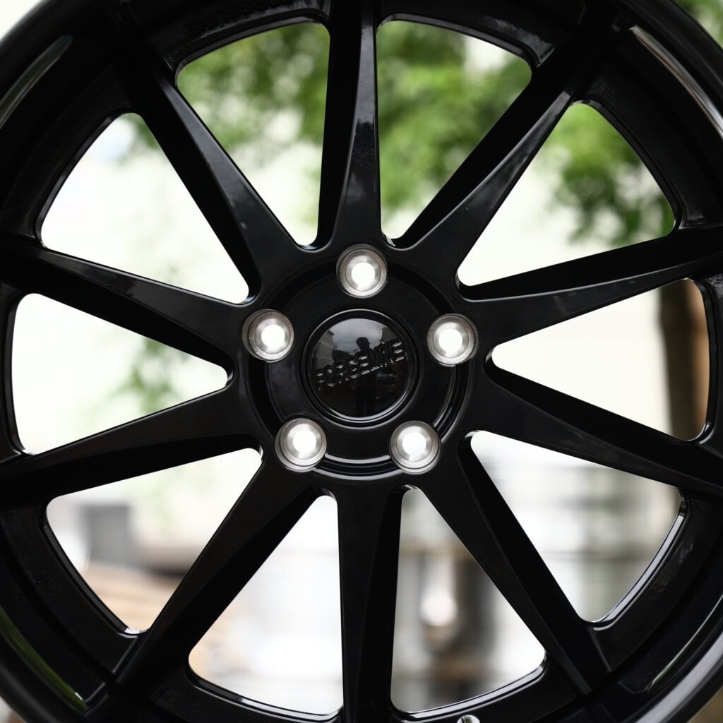 5x114.3 wheels – Gloss Black 10-Spoke Deep Lip (Forgeline-Style), side view