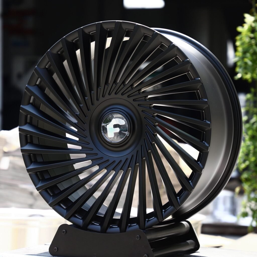 Chevrolet Camaro wheels – Satin Black Swirl Multi-Spoke Floating Cap (Forgiato-Style), angled view