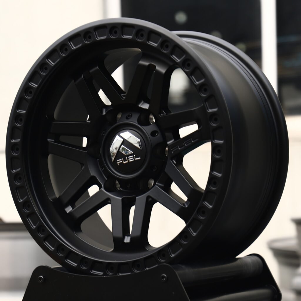 Toyota Tacoma wheels – Matte Black 6 Split-Spoke (Fuel-Style), angled view