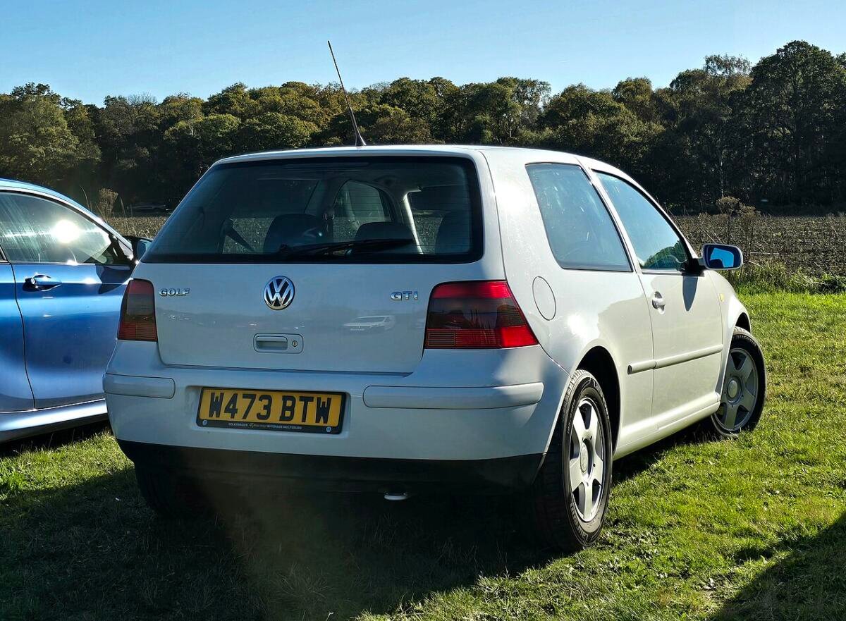 Silver 2000 Mk4 Volkswagen Golf GTI rear three-quarter view on factory 5x100 wheels