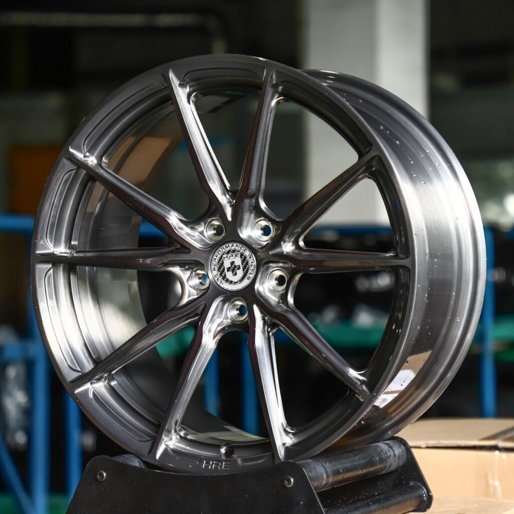 Tesla Model Y wheels – Transparent Black Brushed 10-Spoke (HRE-Style), angled view