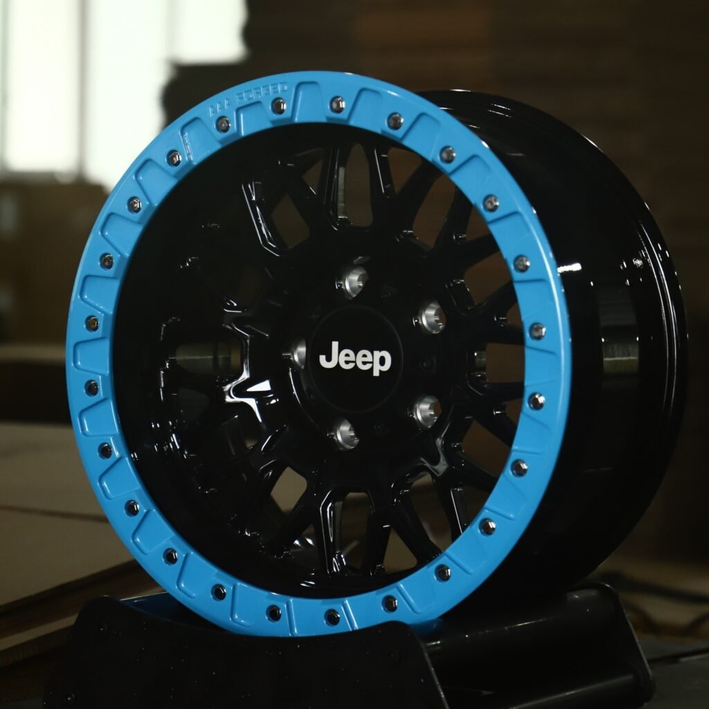 Jeep Wrangler wheels – Gloss Black Mesh Blue Bolted Ring Beadlock (Jeep OEM-Style), angled view