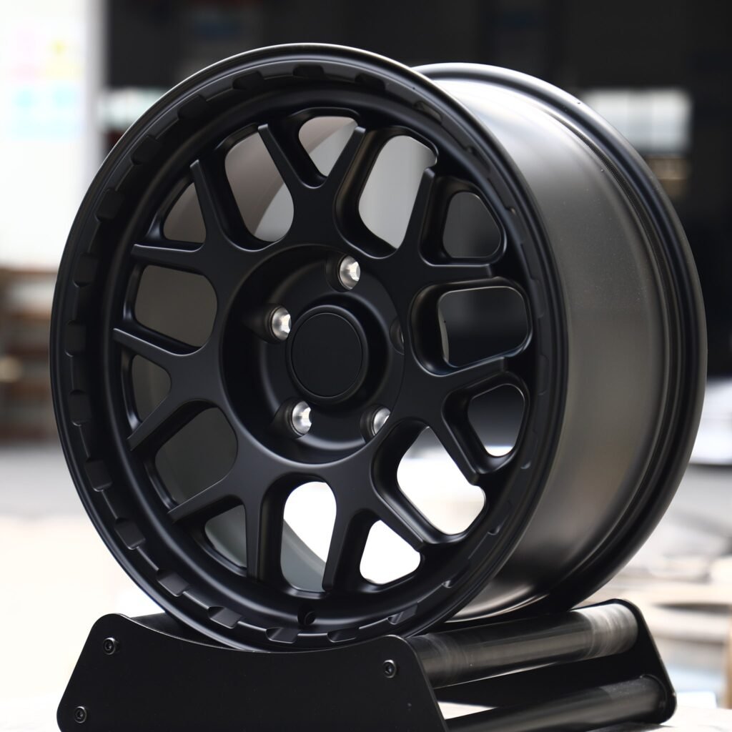 Jeep Gladiator wheels – Matte Black 7 Y-Spoke Deep Lip, angled view