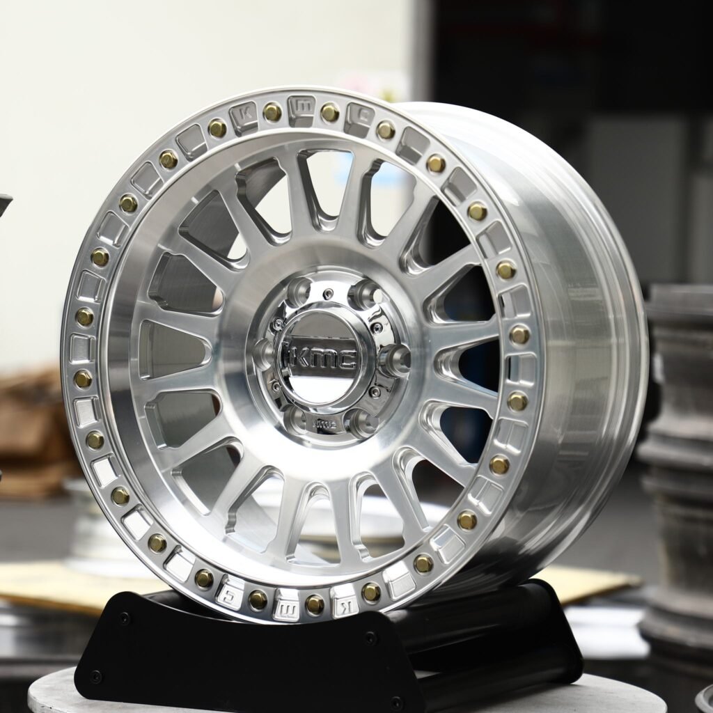 Toyota Tacoma wheels – Brushed Silver Multi-Spoke Beadlock (KMC-Style), angled view