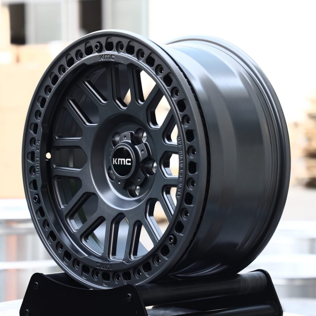 6x139.7 wheels – Matte Black 10-Spoke Beadlock (KMC-Style), side view
