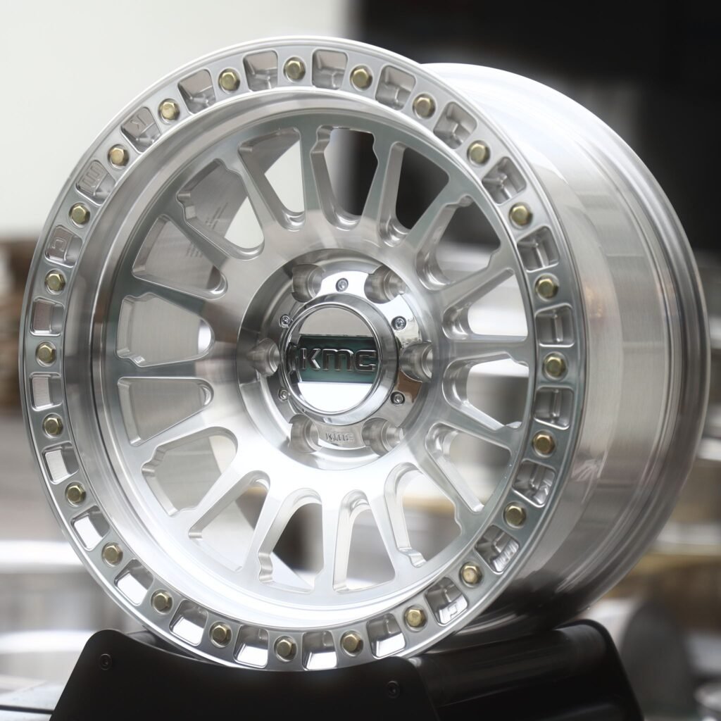 Toyota Tacoma wheels – Mirror Polished 16-Spoke Beadlock (KMC-Style), angled view
