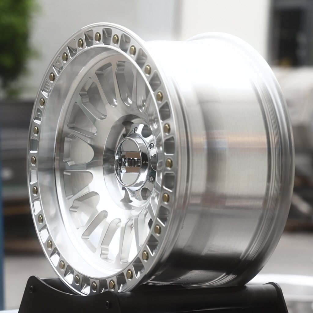 6x139.7 wheels – Mirror Polished 16-Spoke Beadlock (KMC-Style), side view