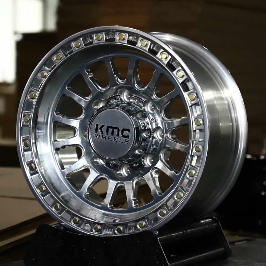 Ram 2500 wheels – Polished 15-Spoke Bolted Ring Black Insert Beadlock (KMC-Style), angled view