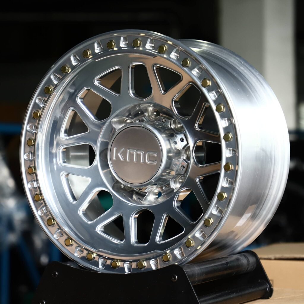 Ram 2500 wheels – Polished Y-Spoke Bolted Ring Beadlock (KMC-Style), angled view