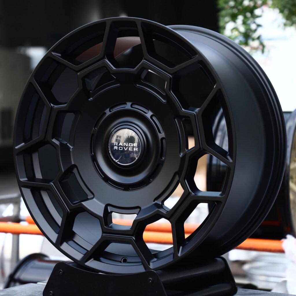 Land Rover Defender wheels – Satin Black Hex-Window Disc (Land Rover OEM-Style), angled view
