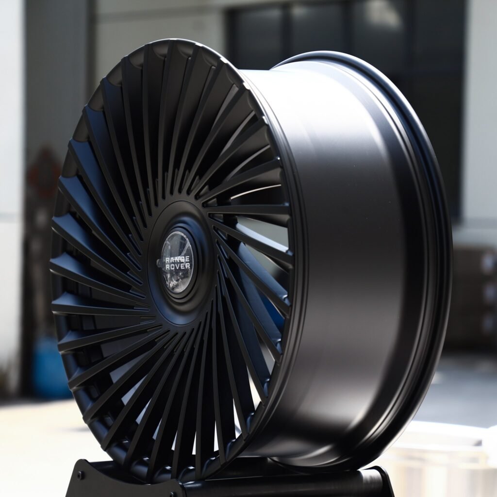 Land Rover Range Rover Sport wheels – Satin Black Swirl Multi-Spoke Floating Cap (Land Rover OEM-Style), angled view