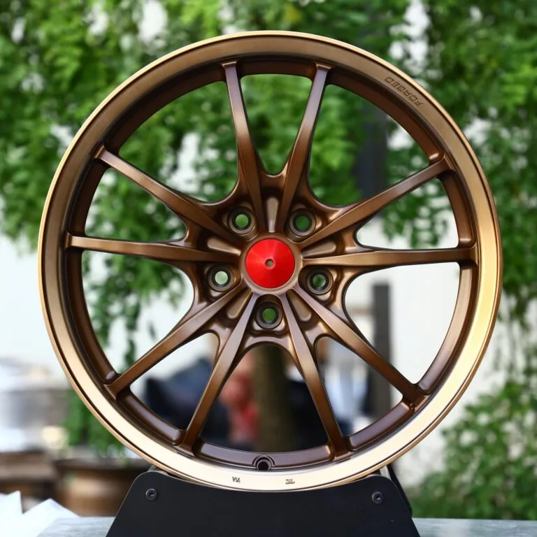 Lexus RX / Toyota Highlander Forged Wheels – Matte Bronze 10-Spoke Red Cone Cap, front view