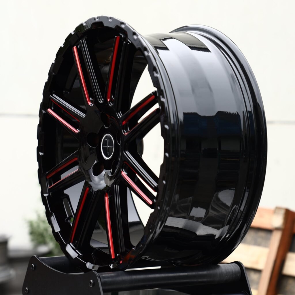 Lincoln Corsair wheels – Gloss Black / Red-Milled Twin 8-Spoke (Lincoln OEM-Style), angled view