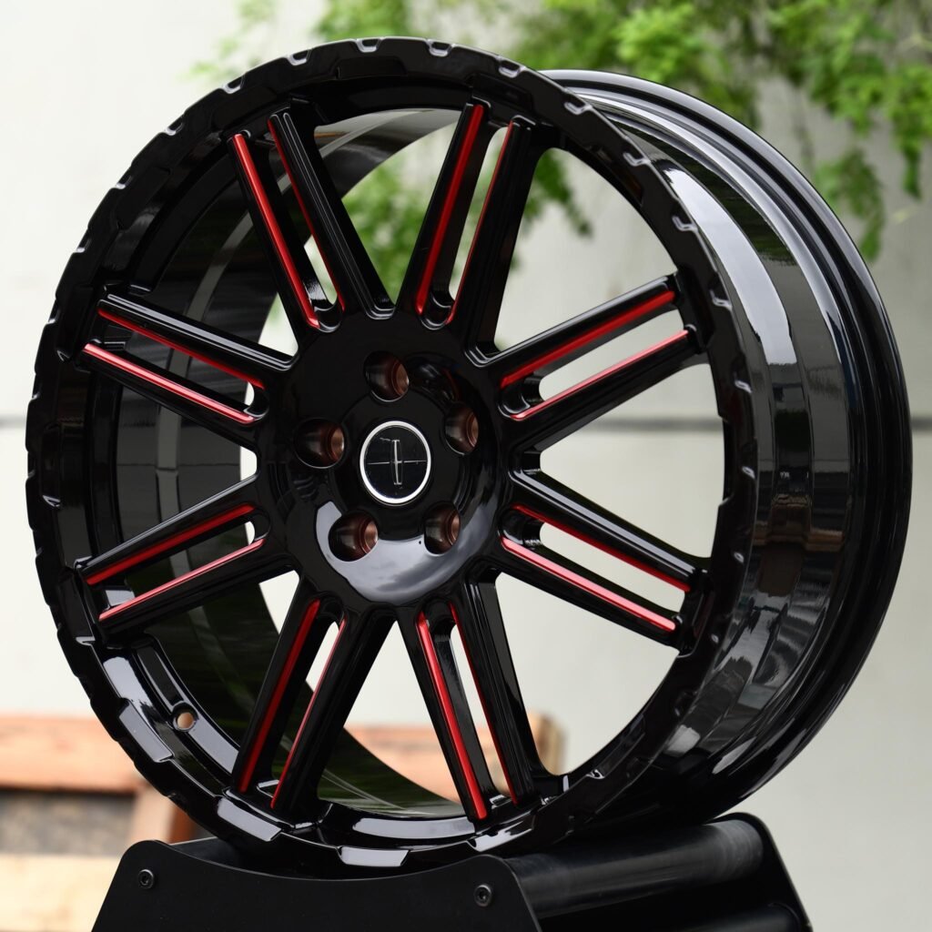 5x114.3 wheels – Gloss Black / Red-Milled Twin 8-Spoke (Lincoln OEM-Style), side view