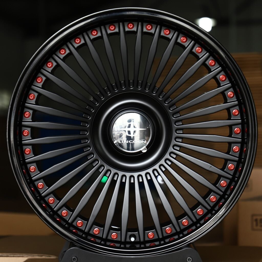 Lincoln Continental wheels – Satin Black Multi-Spoke 2-Piece Red-Rivet Floating Cap (Lincoln OEM-Style), front view